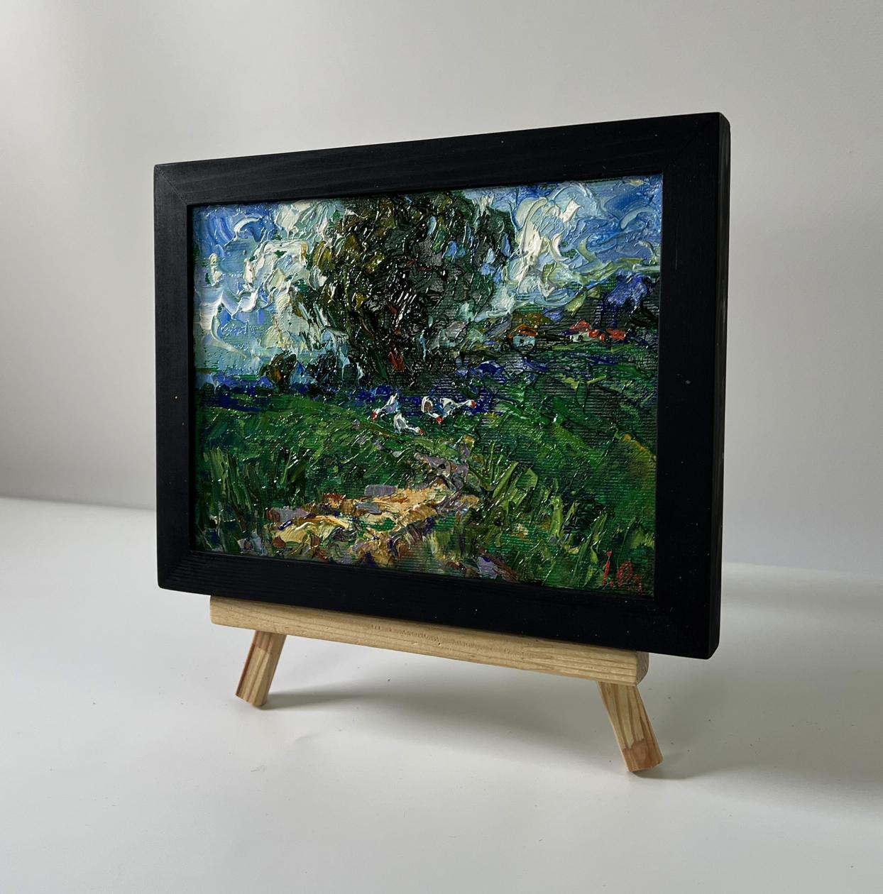 Miniature black-framed oil painting Before the Storm by Oleksiy Ivanyuk on rustic easel