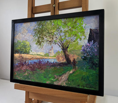 Oil painting The earth awakens in sunlight by Boris Serdyuk, vibrant green tree