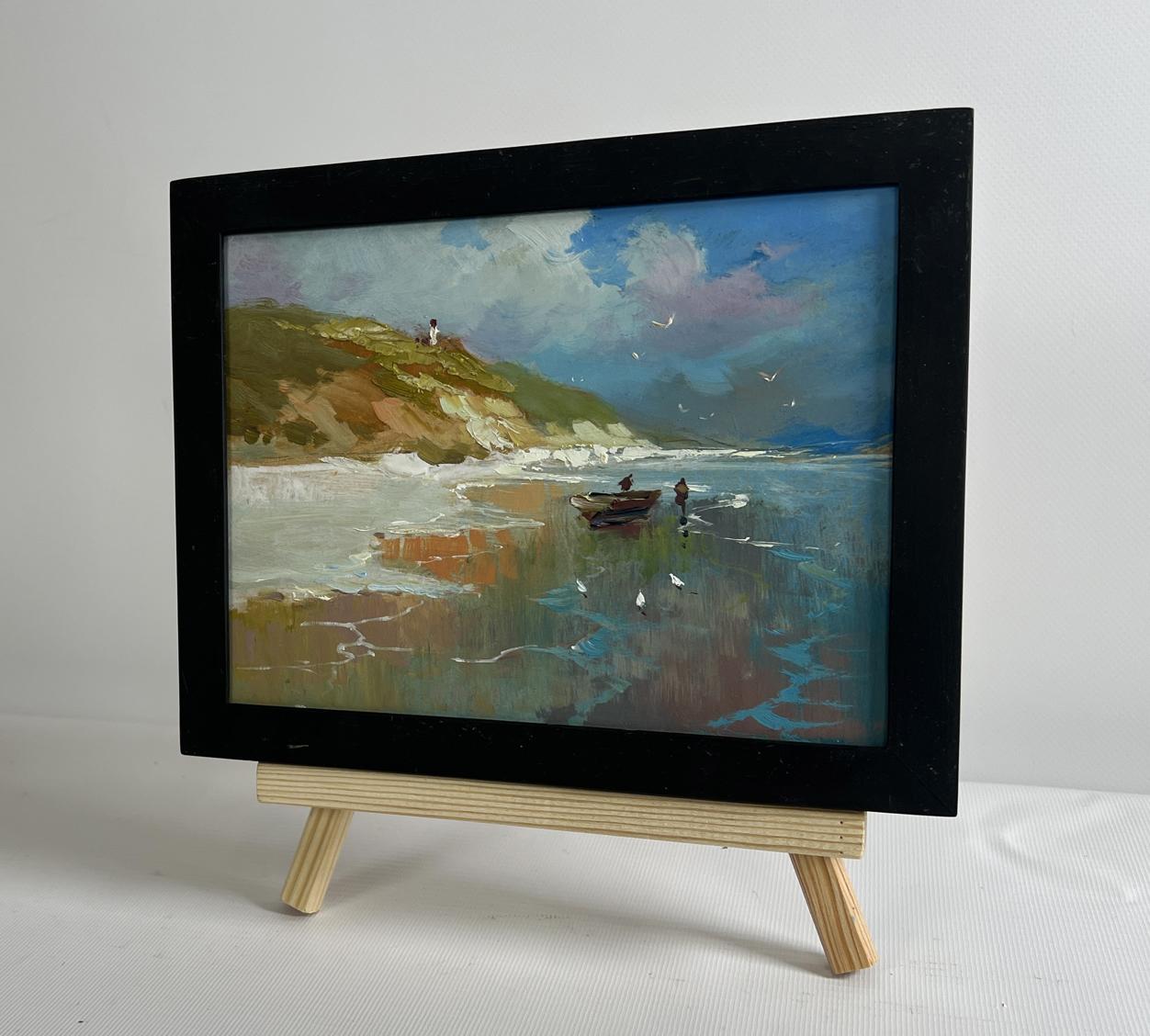 Oil painting The mountains touch the sea by Yuriy Suprunchuk on wooden easel