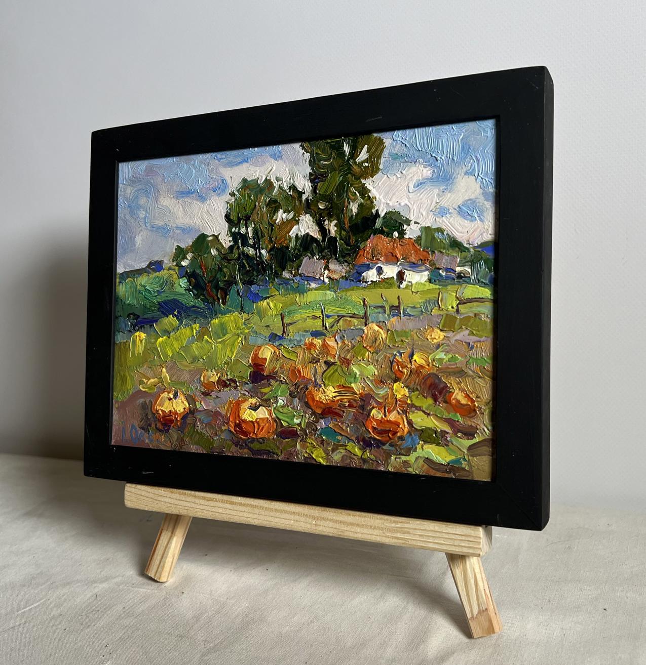 Vibrant impressionist oil painting of pumpkin garden by Oksana Ivanyuk in black frame