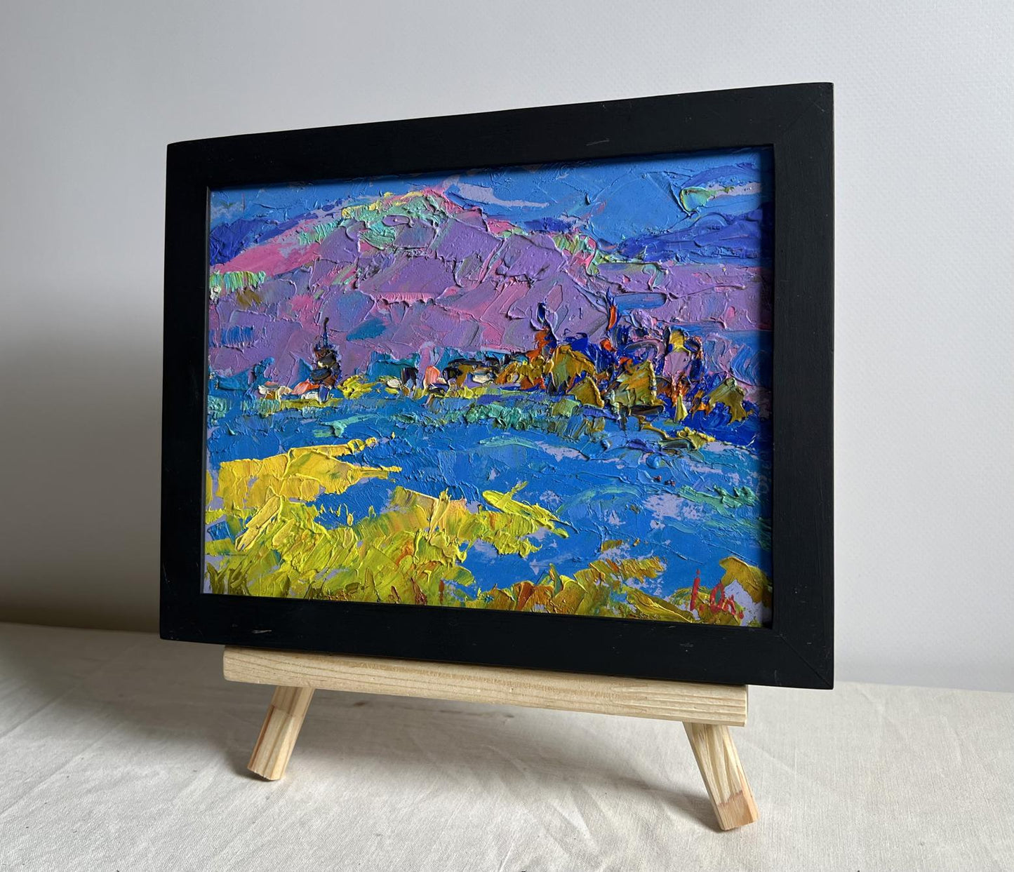 Oil painting Twilight in the Mountains by Oleksiy Ivanyuk in black frame