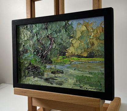 Oil painting Trees above the river by Boris Serdyuk in black frame