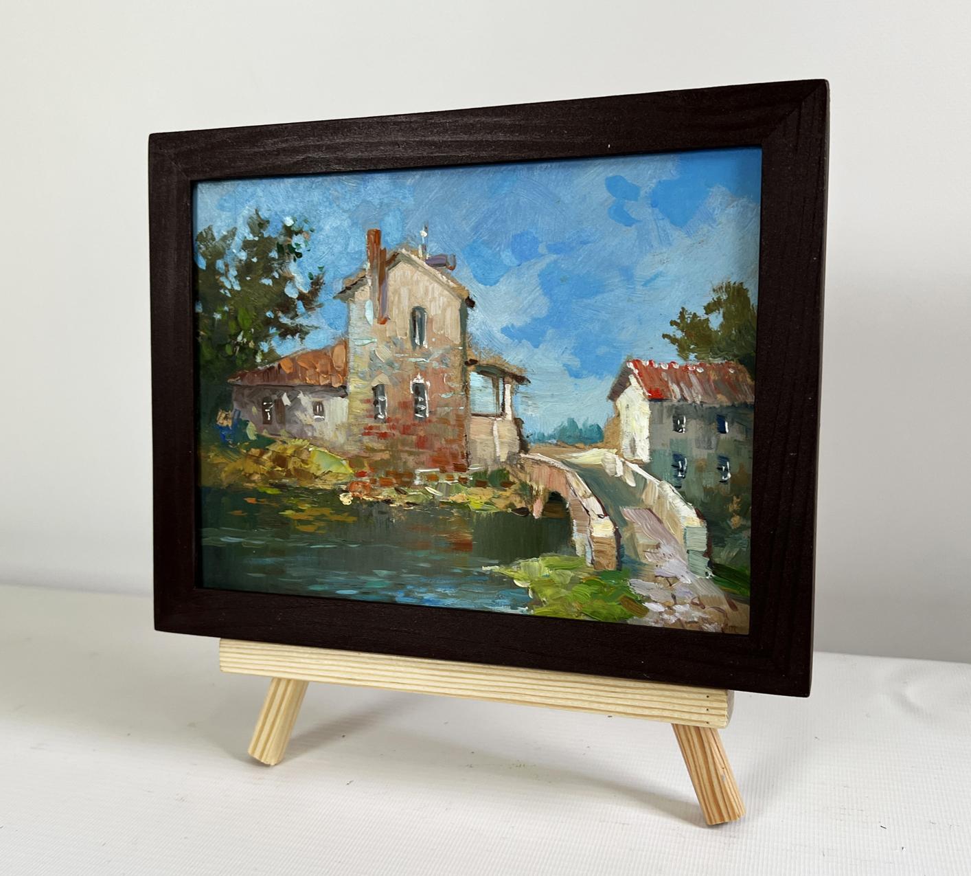 Dark wooden-framed oil painting of Yuriy Suprunchuk bridge to city