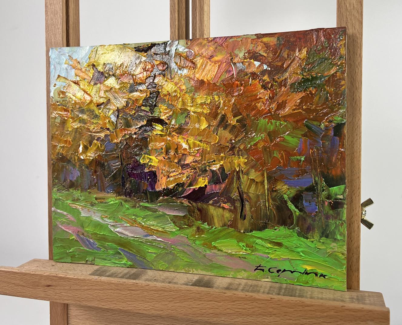 Oil painting Autumn sparkles with gold by Boris Serdyuk on easel