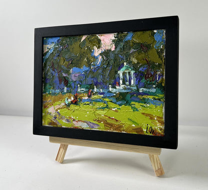 Oil painting A Walk in the Park by Oleksiy Ivanyuk lush garden scene