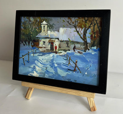 Oil painting by Yuriy Suprunchuk: snow-covered village after winter storm