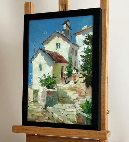 Black-framed oil painting of old Yuriy Suprunchuk Mediterranean village street