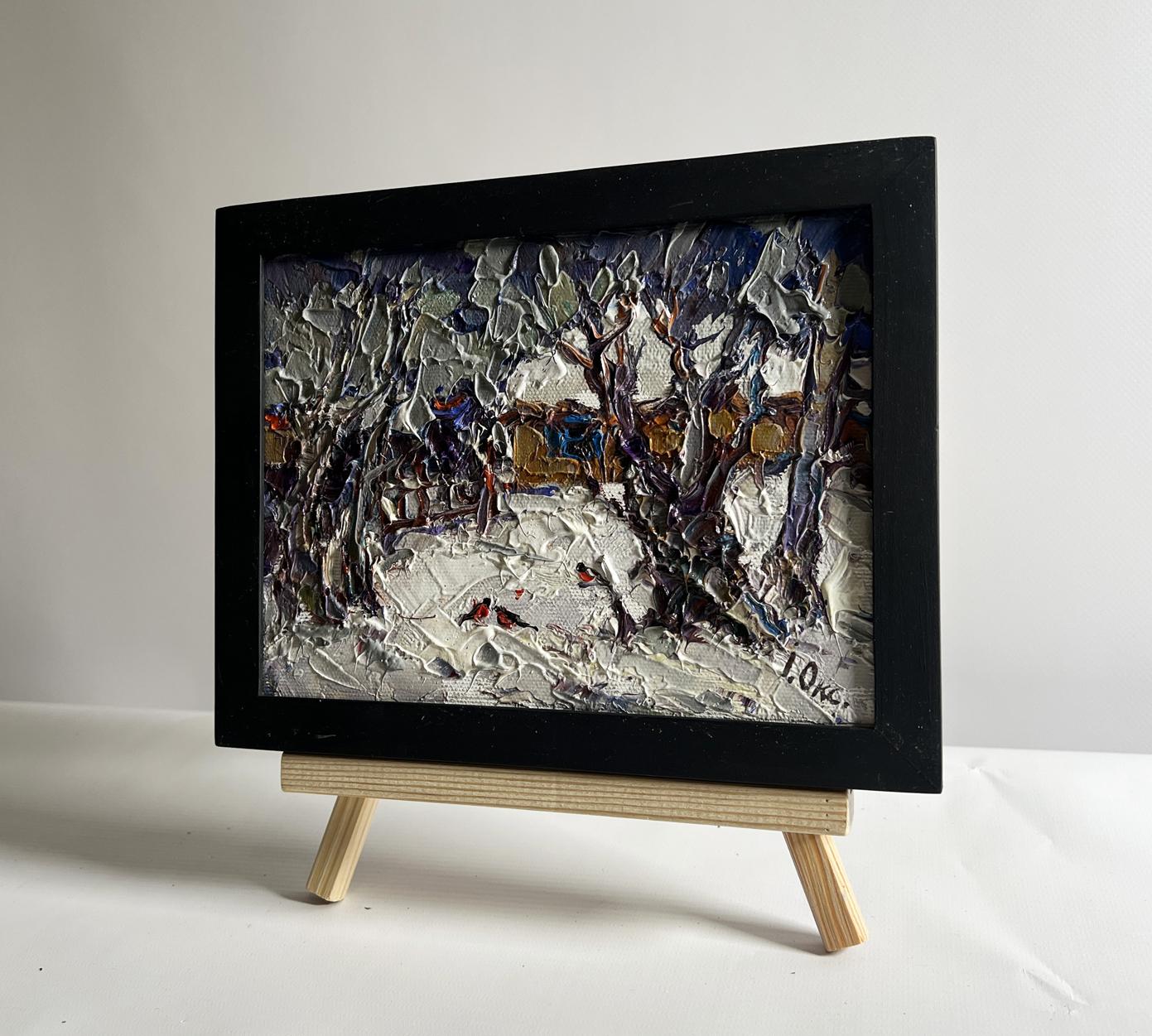 Oil painting Bullfinch in snowy yard by Oksana Ivanyuk, black frame