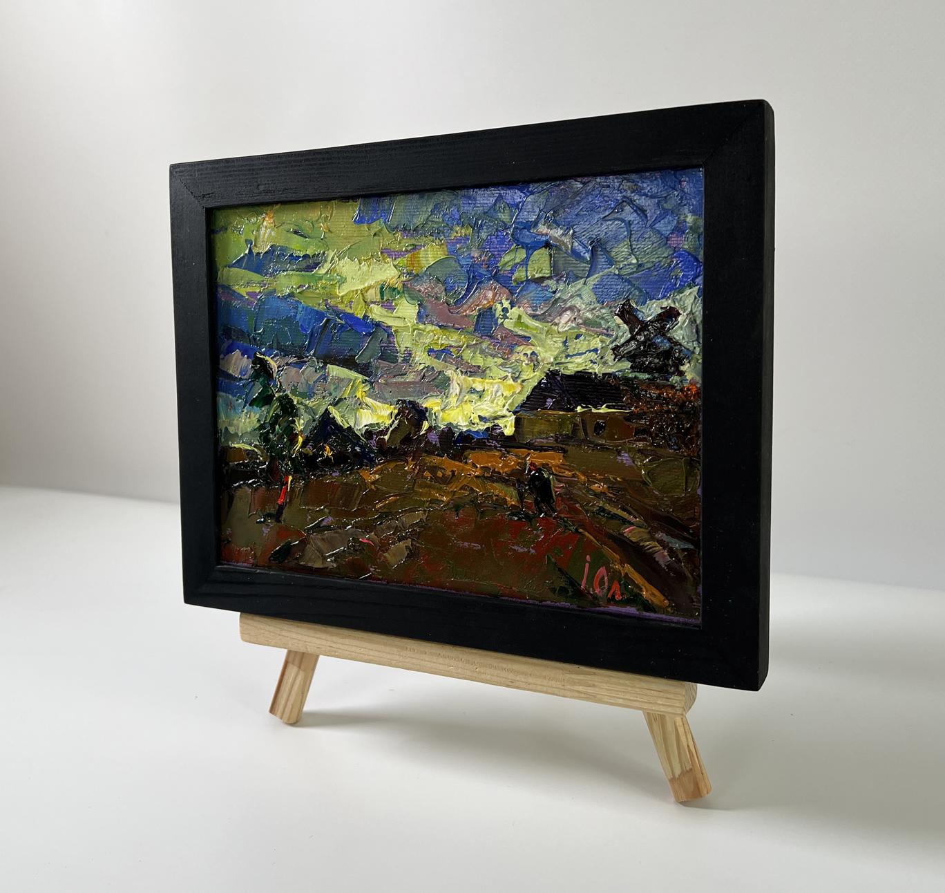 Oil painting of colorful village sky by Oleksiy Ivanyuk in black frame