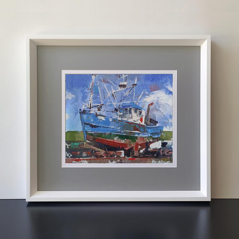 Oil painting of blue red ship at sea by Volodymyr Gluhomanyuk in white frame