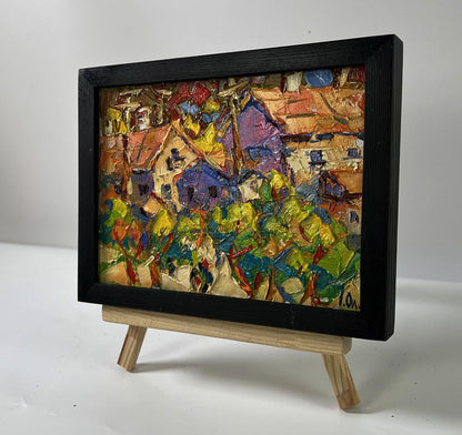 Vibrant oil painting of summer village heat by Oleksiy Ivanyuk in black frame