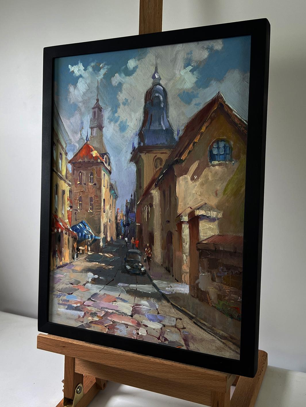 Oil painting Quiet street in old town by Yuriy Suprunchuk in black frame