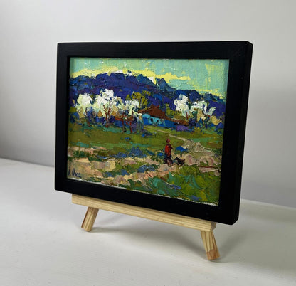 Oil painting Beyond the Village the Path to Freedom by Oksana Ivanyuk in black frame