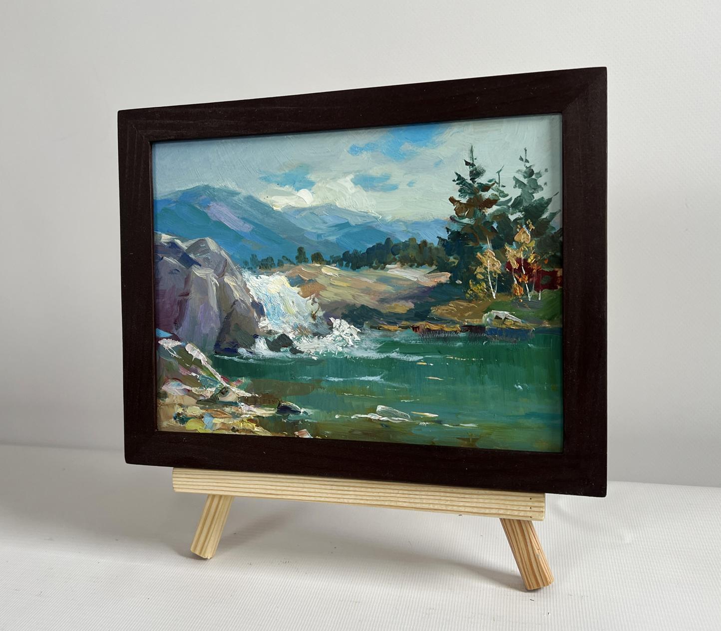 Oil painting of waterfall in mountains by Yuriy Suprunchuk in dark frame
