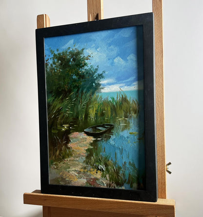 Framed oil painting of sunny lakeside by Yuriy Suprunchuk
