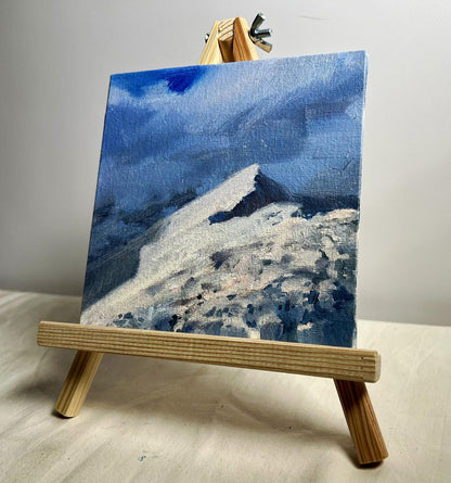 Oil painting of snowy mountain peak by Tatyana Derdey in textured acrylics