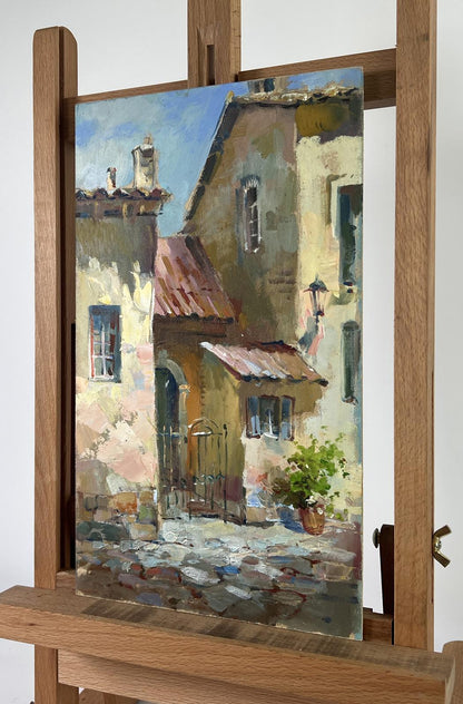 Warm-toned oil painting by Yuriy Suprunchuk: sunlit European alley path to house