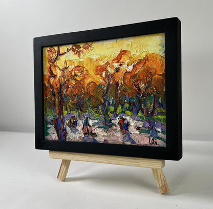 Vibrant impressionist oil painting Steps through autumn by Oleksiy Ivanyuk in black frame on wooden easel