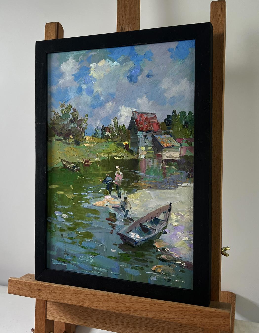 Framed impressionist oil painting of fishermen resting by lakeside village shore by Yuriy Suprunchuk