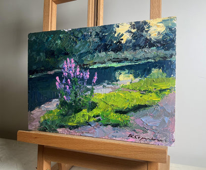 Vibrant impressionist oil painting of purple flowers, green fields near summer river by Boris Serdyuk on wooden easel