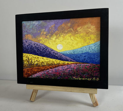 Oil painting of scarlet-toned mountain range by V. Zadorozhnya