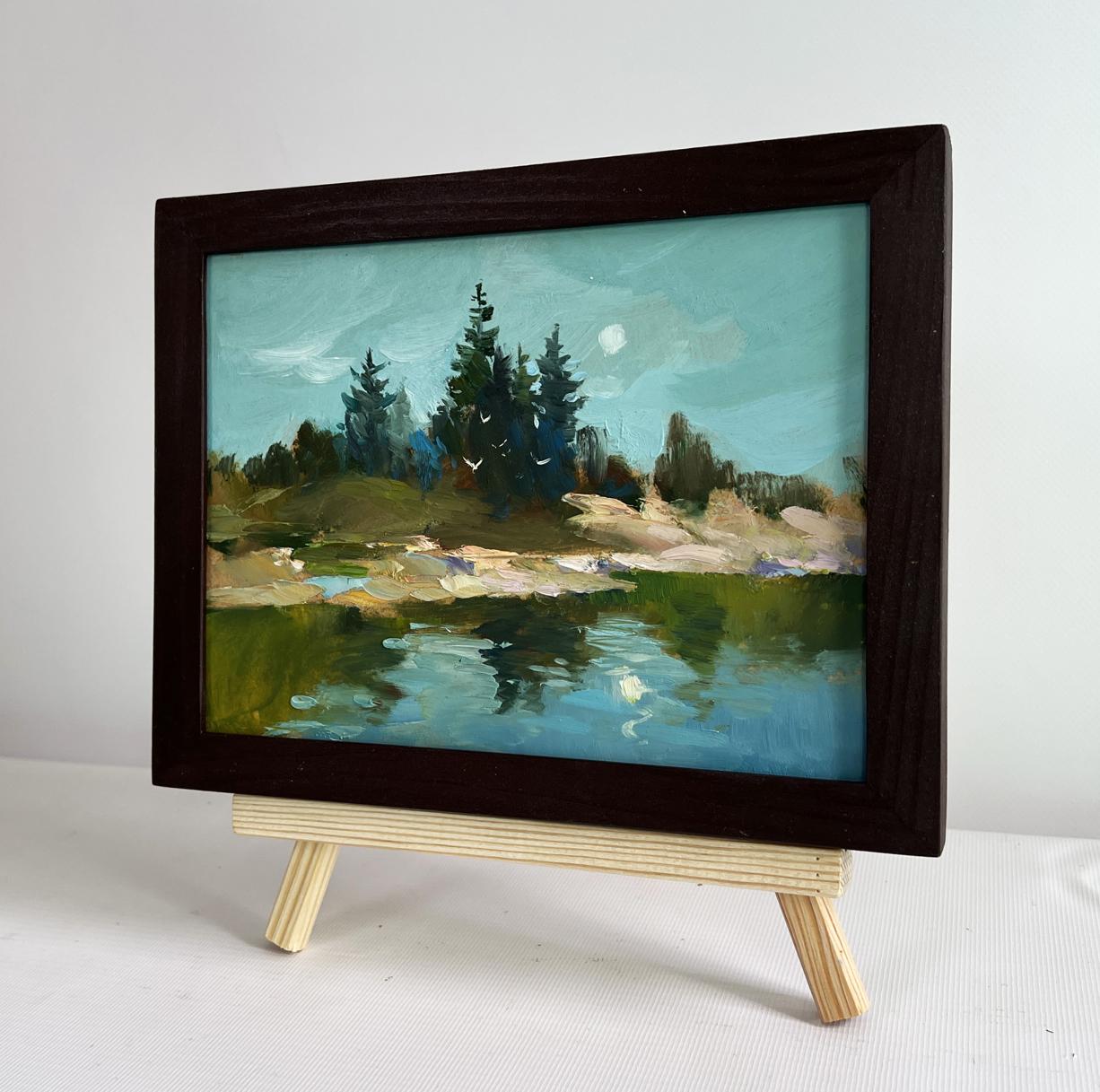 Dark wooden-framed oil painting of Forest in river reflection by Yuriy Suprunchuk