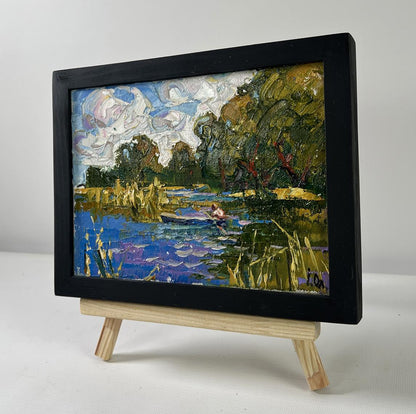 Oil painting of serene river boat ride by Oleksiy Ivanyuk
