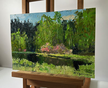 Oil painting Spring lake in the forest by Boris Serdyuk on wooden easel