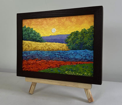 Oil painting Golden evening over green expanses by V. Zadorozhnya in wooden frame