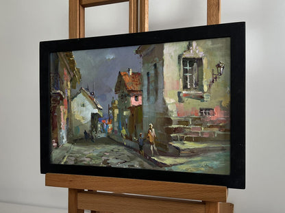 Oil painting Walking along the city street by Yuriy Suprunchuk in black frame