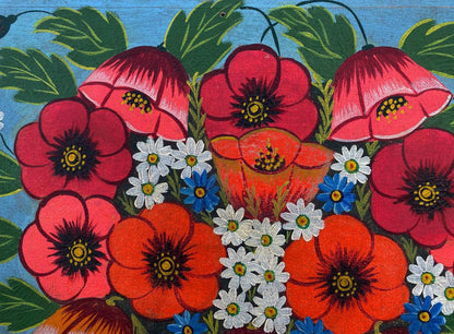 Oil painting of red poppies in basket with daisies and blue flowers