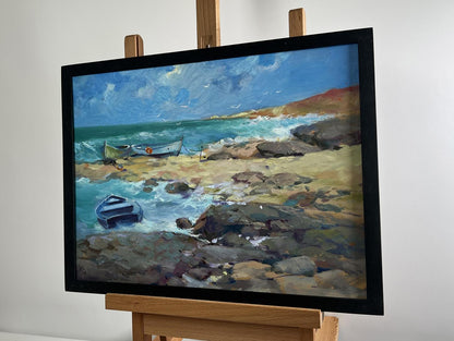 Oil painting Freedom over the Sea by Yuriy Suprunchuk in black frame on easel