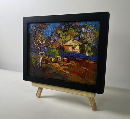 Oil painting Evening ray over spring fields by Oleksiy Ivanyuk in black frame