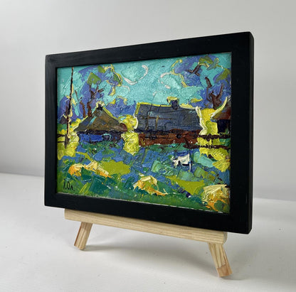 Oil painting Moonlit night in the village by Oleksiy Ivanyuk in black frame