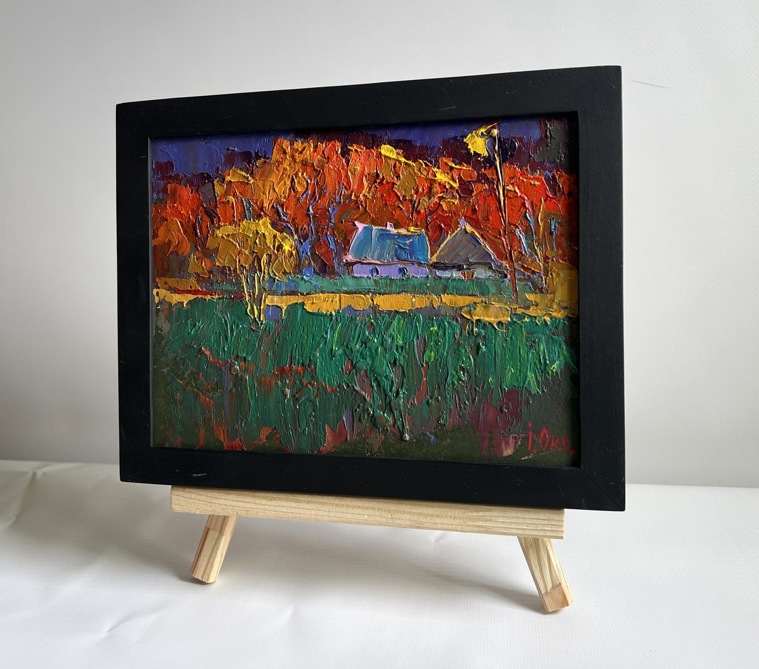Oil painting Crimson Autumn in the Village by Oksana Ivanyuk in black frame