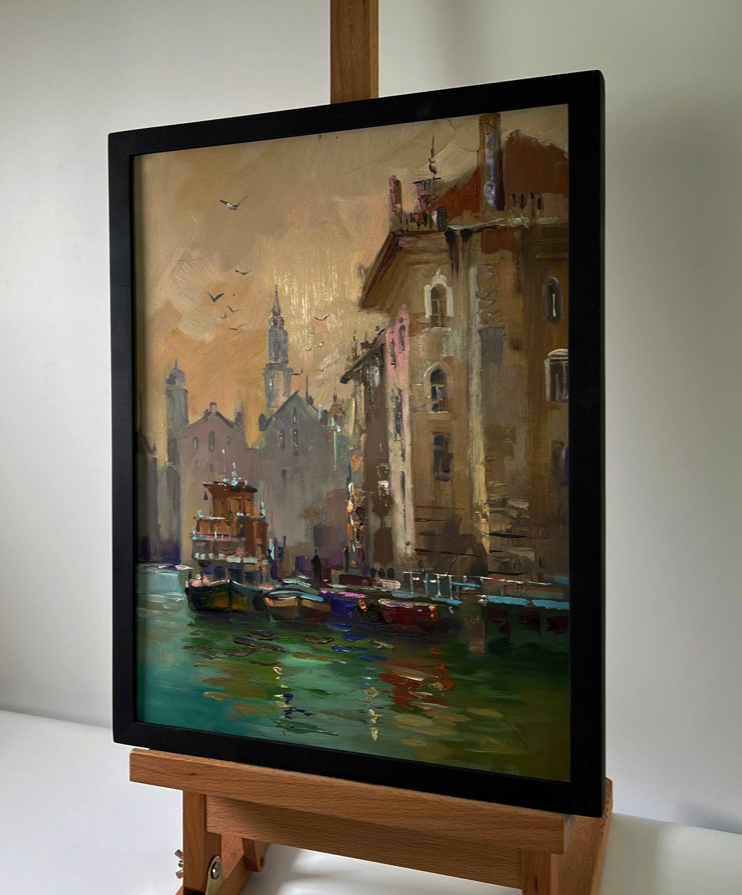 Framed oil painting of canal with sailboats by Yuriy Suprunchuk