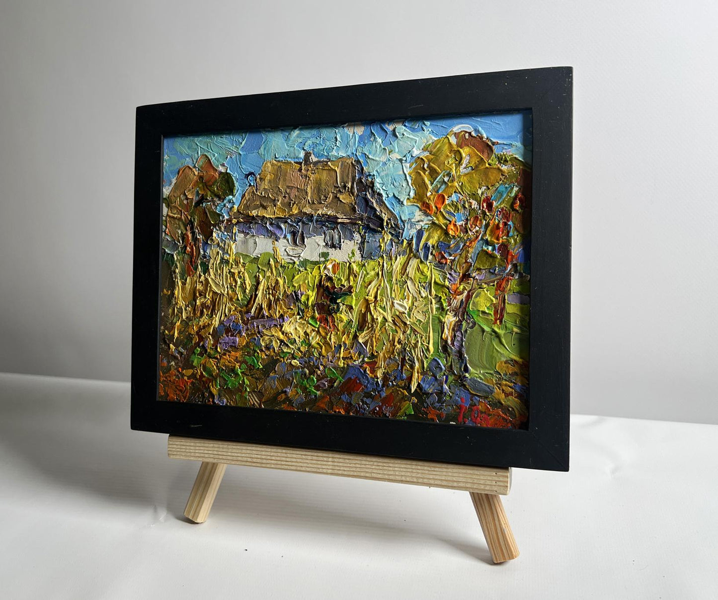 Oil painting Autumn gardening time by Oleksiy Ivanyuk in black frame