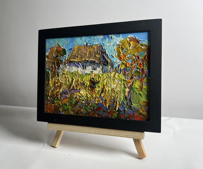 Oil painting Autumn gardening time by Oleksiy Ivanyuk in black frame