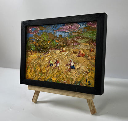 Oil painting Harvesting hay in the field by Oleksiy Ivanyuk in black frame