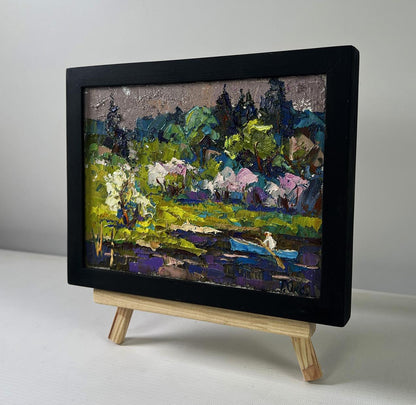 Oil painting Breath of Spring in Green Groves by Oksana Ivanyuk in black frame