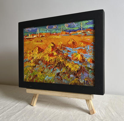 Oil painting Hay harvest in autumn by Oleksiy Ivanyuk in black frame