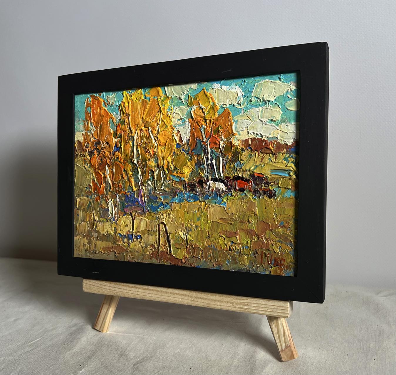 Vibrant oil painting of autumn sunny day by Oksana Ivanyuk in black frame