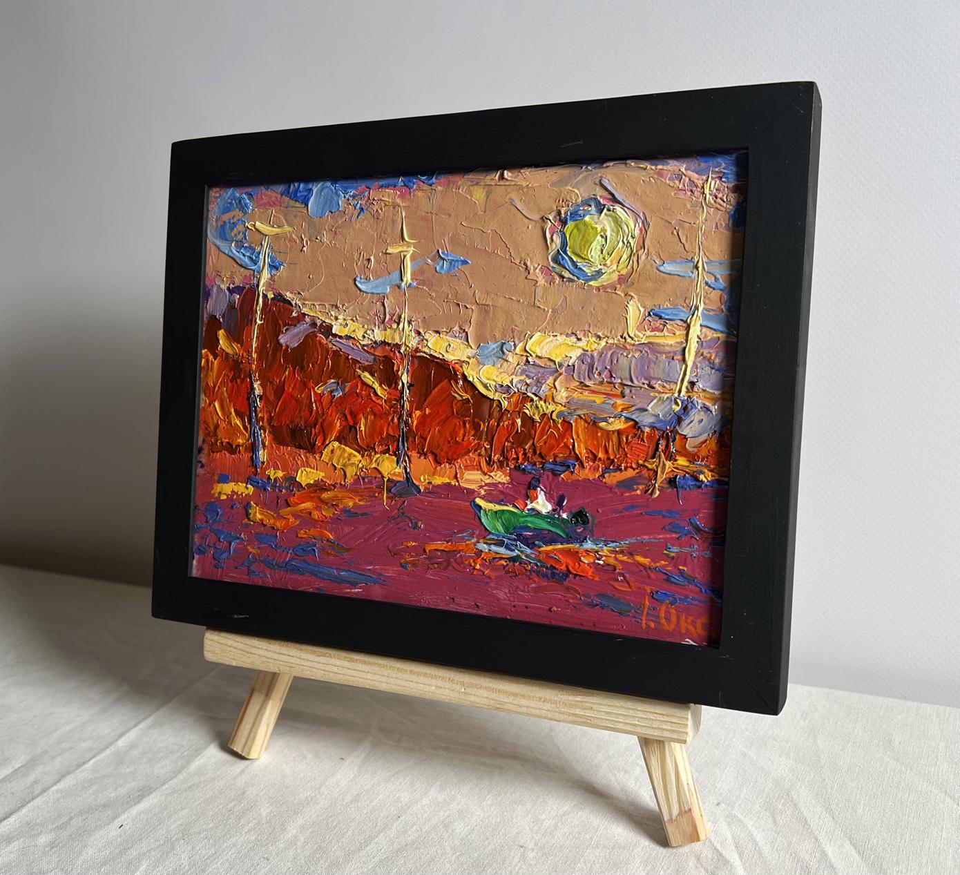 Oil painting of sailing into sunset by Oksana Ivanyuk in black frame