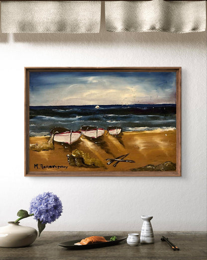 Framed oil painting of three boats on sandy beach under dramatic sky by artist m