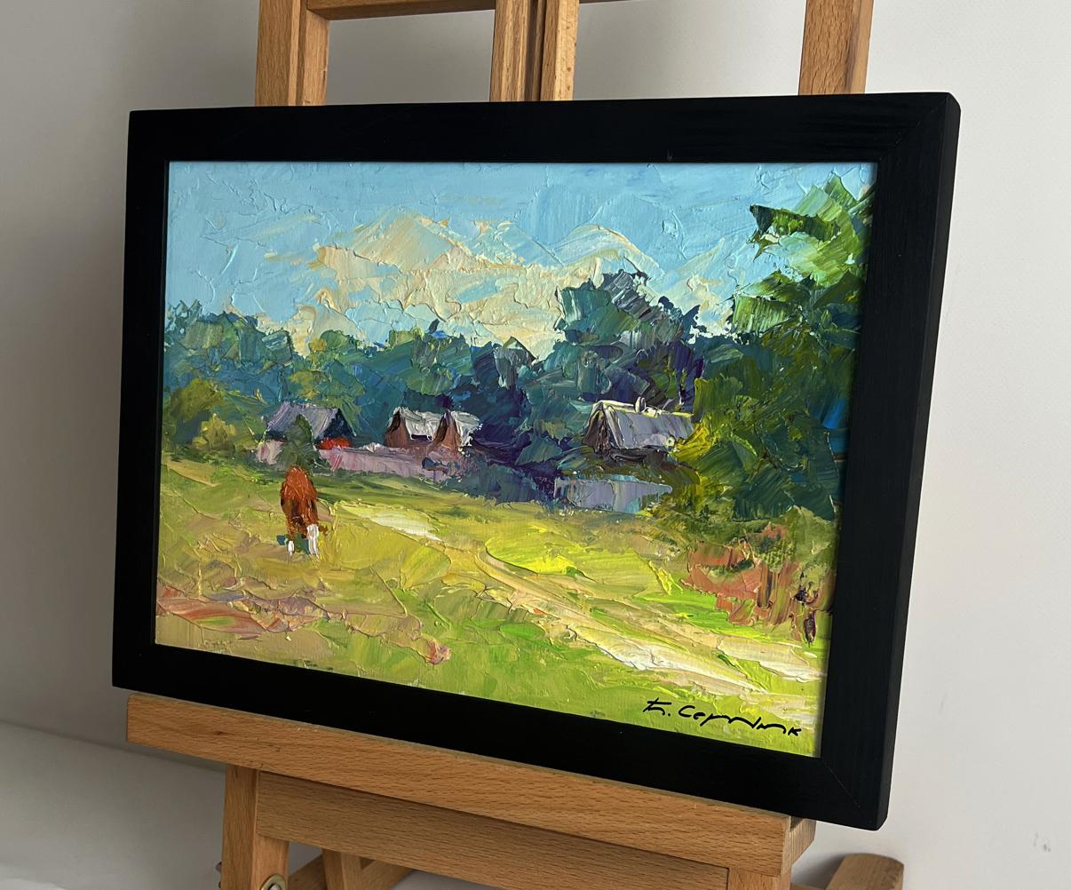 Black-framed oil painting of red cow near houses by Boris Serdyuk