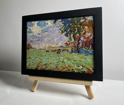 Oil painting Shepherd in the field by Oleksiy Ivanyuk in black frame