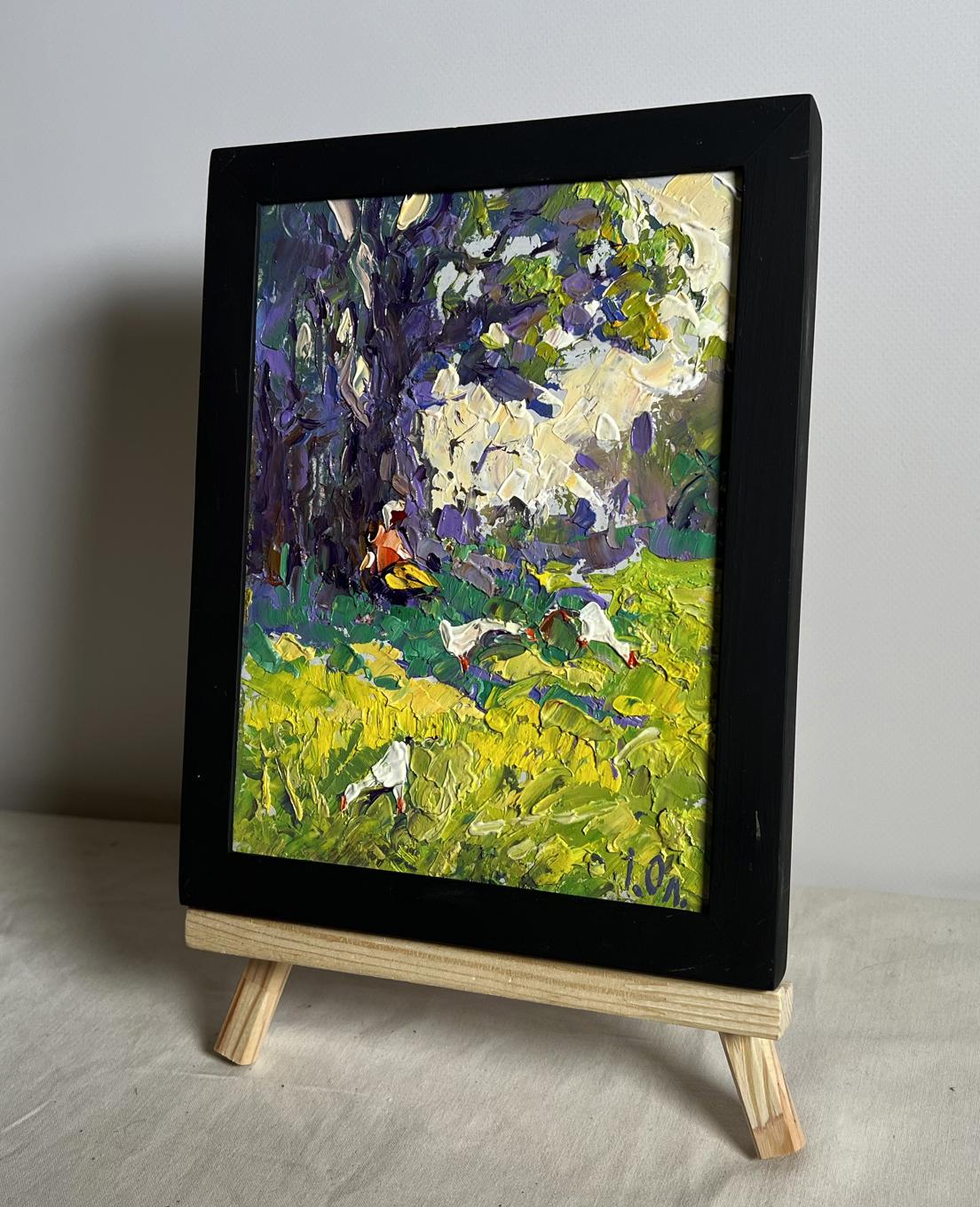 Oil painting Relaxing in the Meadow by Oleksiy Ivanyuk with figure among birds