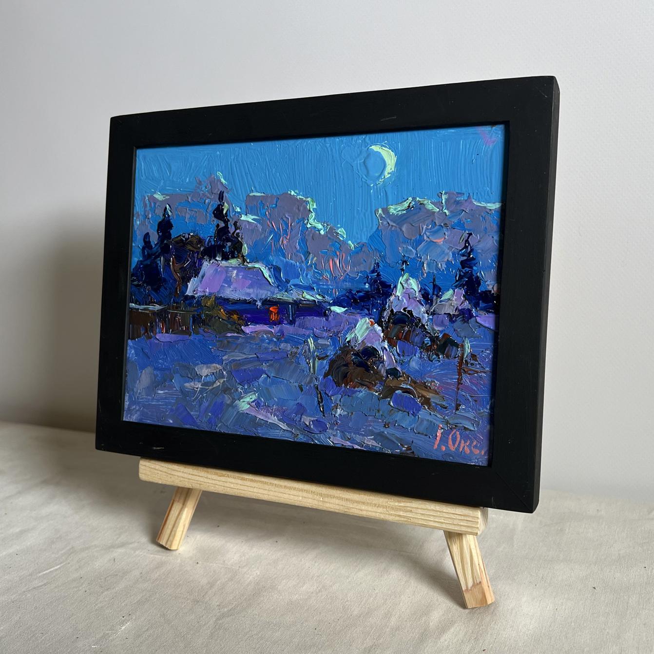 Framed oil painting by Oksana Ivanyuk: moonlit snowy village night