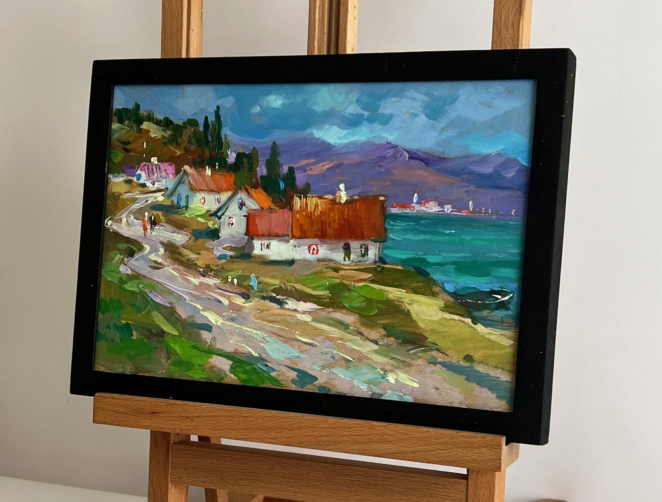 Framed oil painting of coastal village by Yuriy Suprunchuk