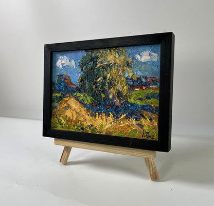 Oil painting Summer haymaking by Oksana Ivanyuk in black frame